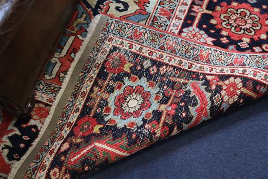 A Heriz carpet, 11ft 10in by 9ft 2in.